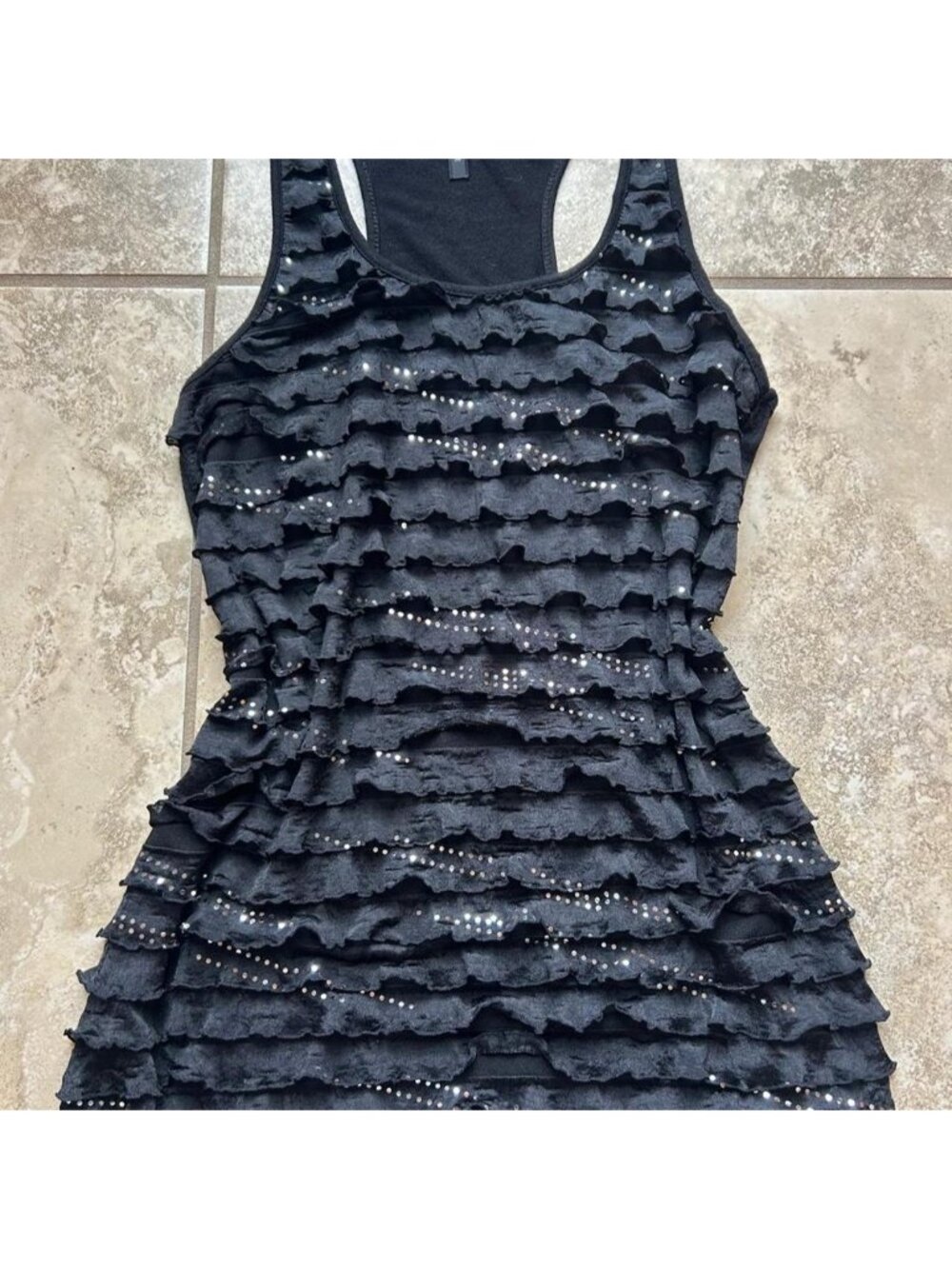 Black ruffle tank top with silver detailsize M...